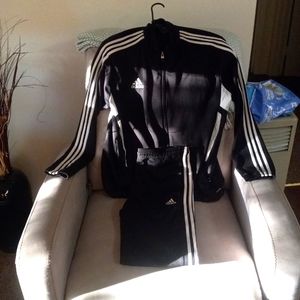 Adidas (Full Suit) Top and Bottom XL but fitted.Black & white strips. Make offer